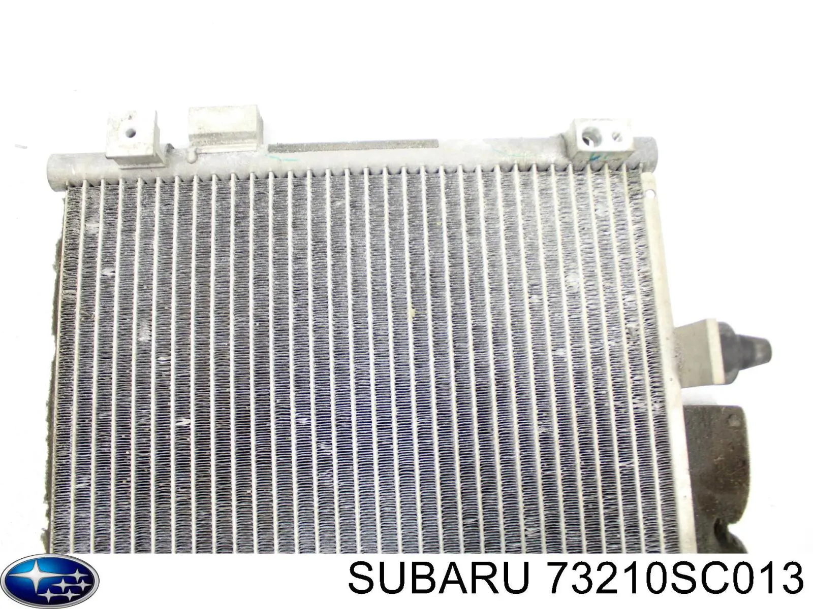 Радиатор кондиционера 73210SC013 Subaru