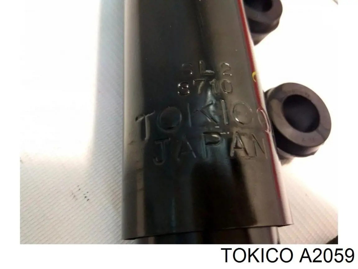 Купить A2059 Tokico Амортизатор подвески передний левый