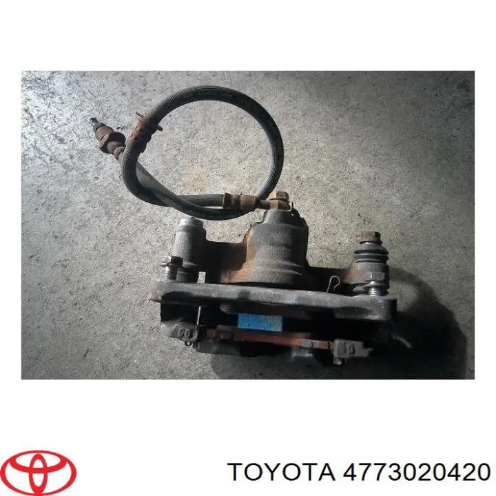 Pinza de freno trasero derecho 4773020420 Toyota