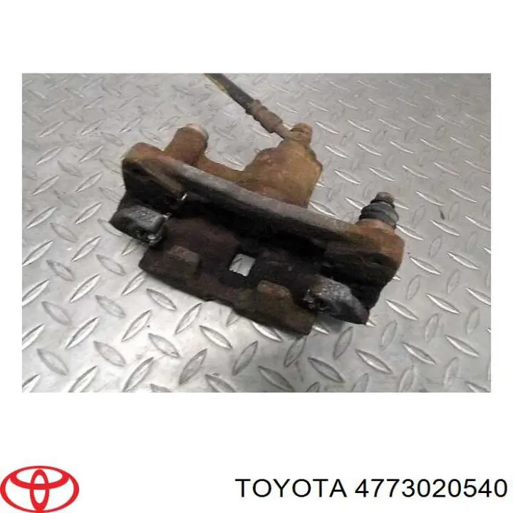 Pinza de freno trasero derecho 4773020540 Toyota