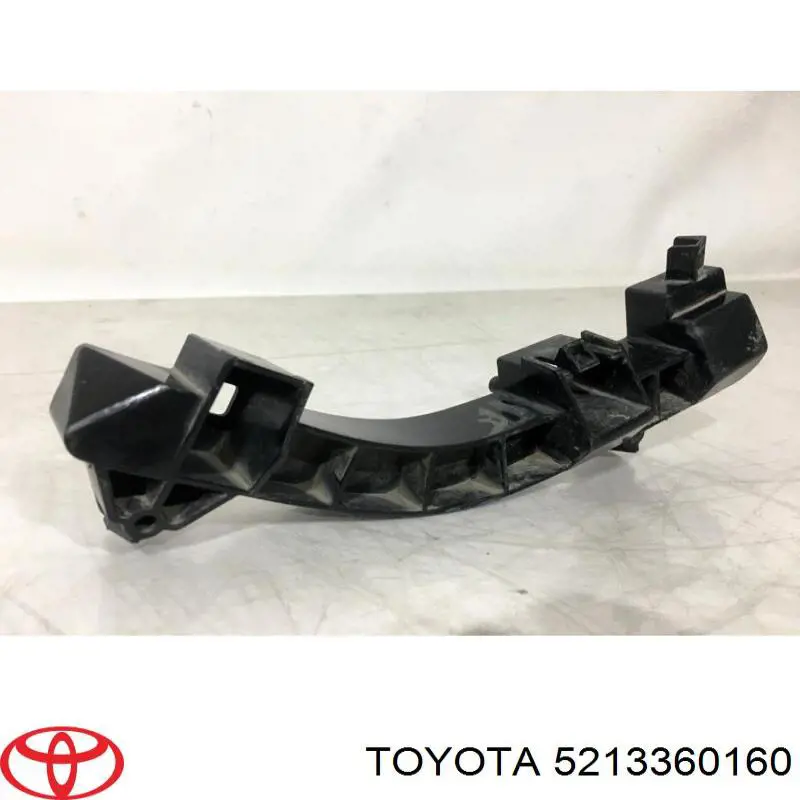 5213360160 Toyota consola (adaptador de fixação da luz dianteira direita)
