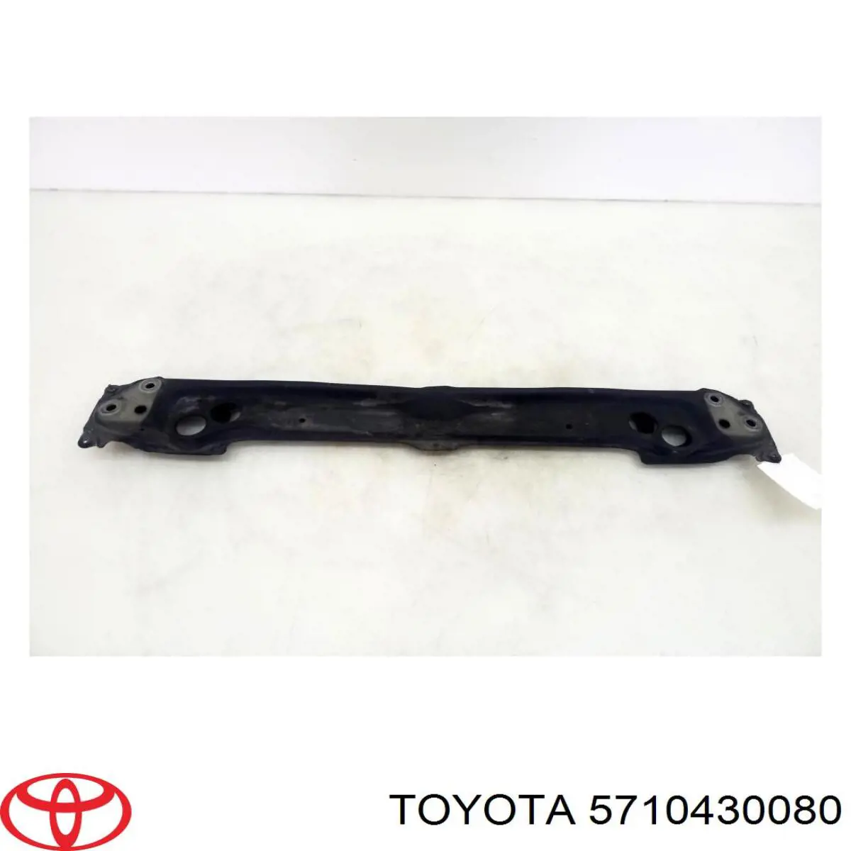 5710430080 Toyota суппорт радиатора нижний (монтажная панель крепления фар)