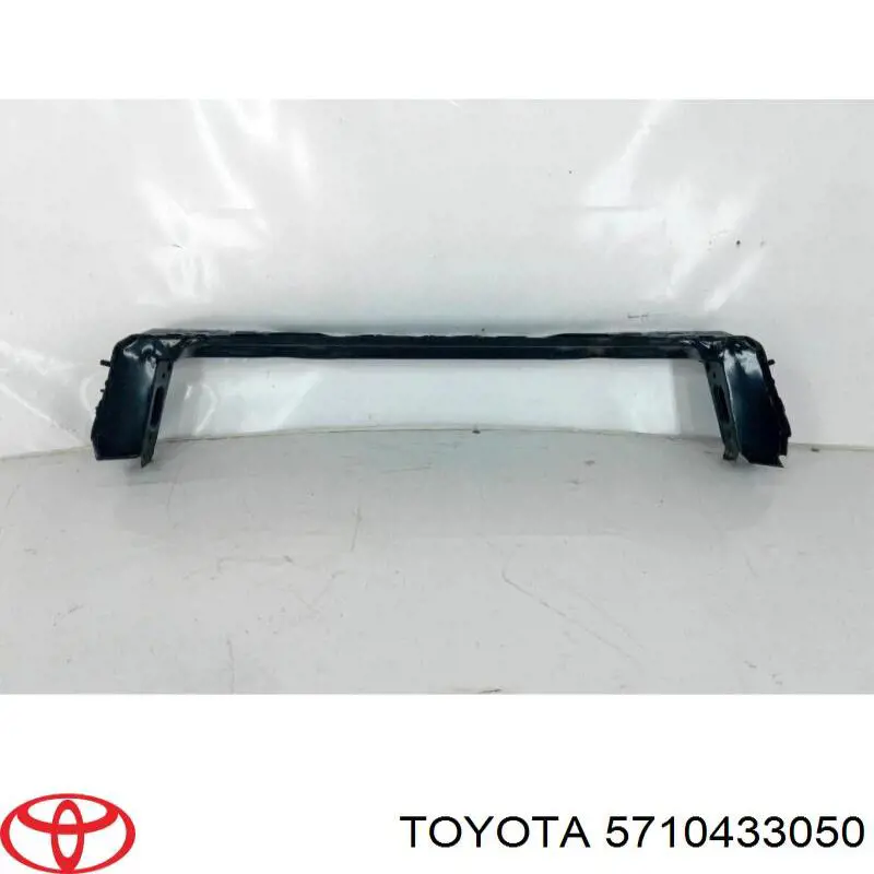 5710433050 Toyota суппорт радиатора нижний (монтажная панель крепления фар)