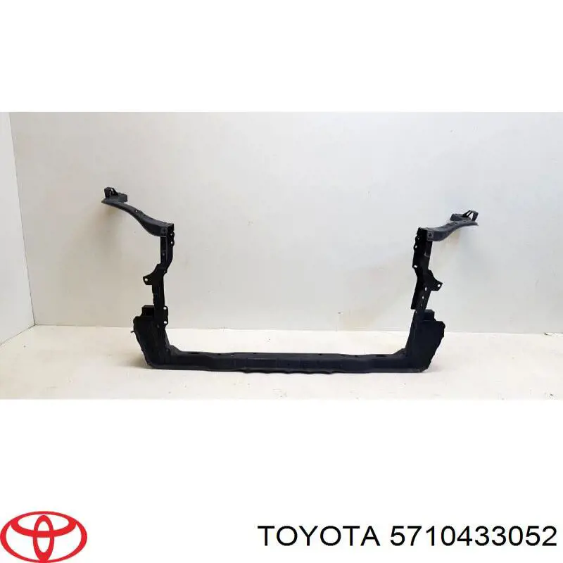 5710433052 Toyota суппорт радиатора нижний (монтажная панель крепления фар)