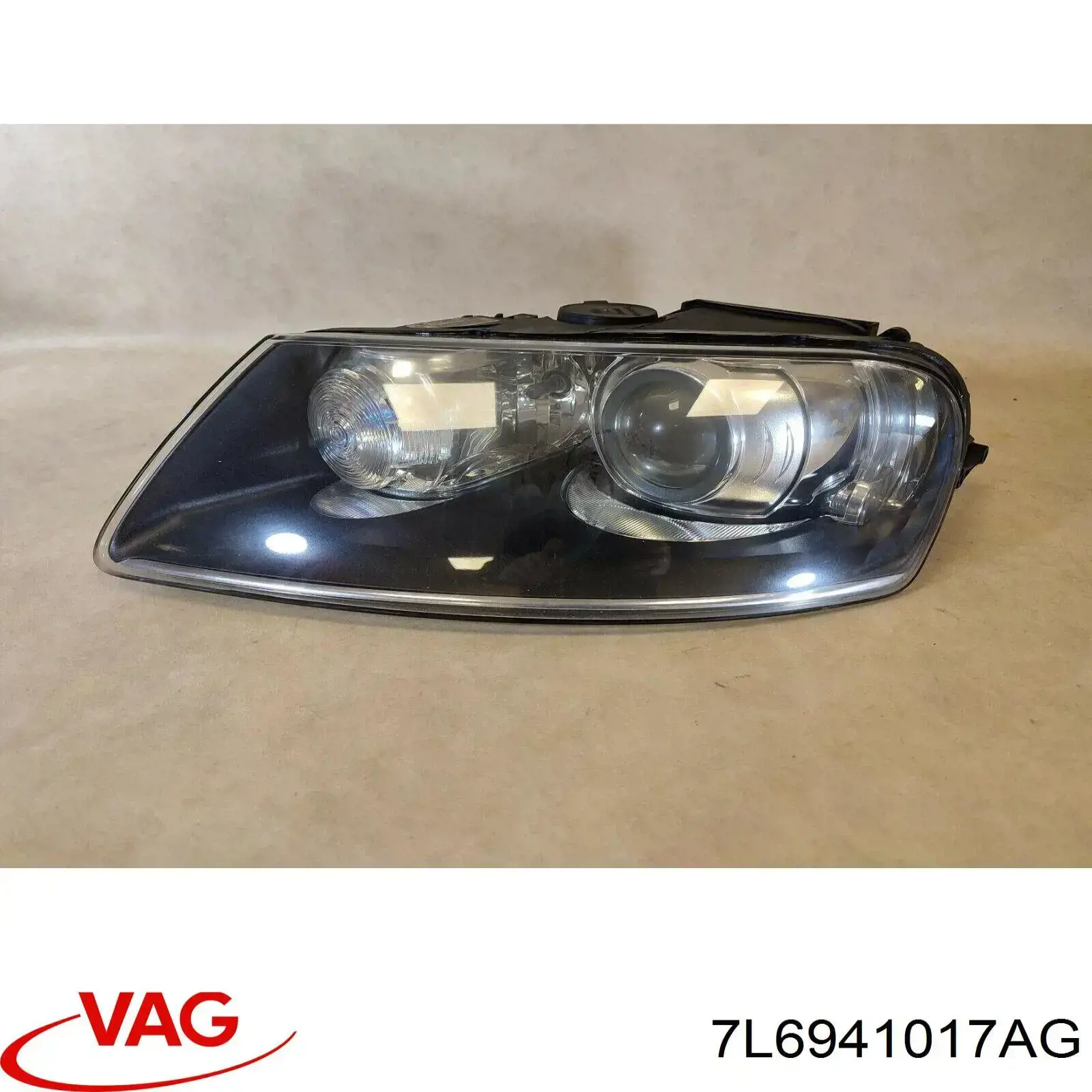 Фара левая 7L6941017AG VAG