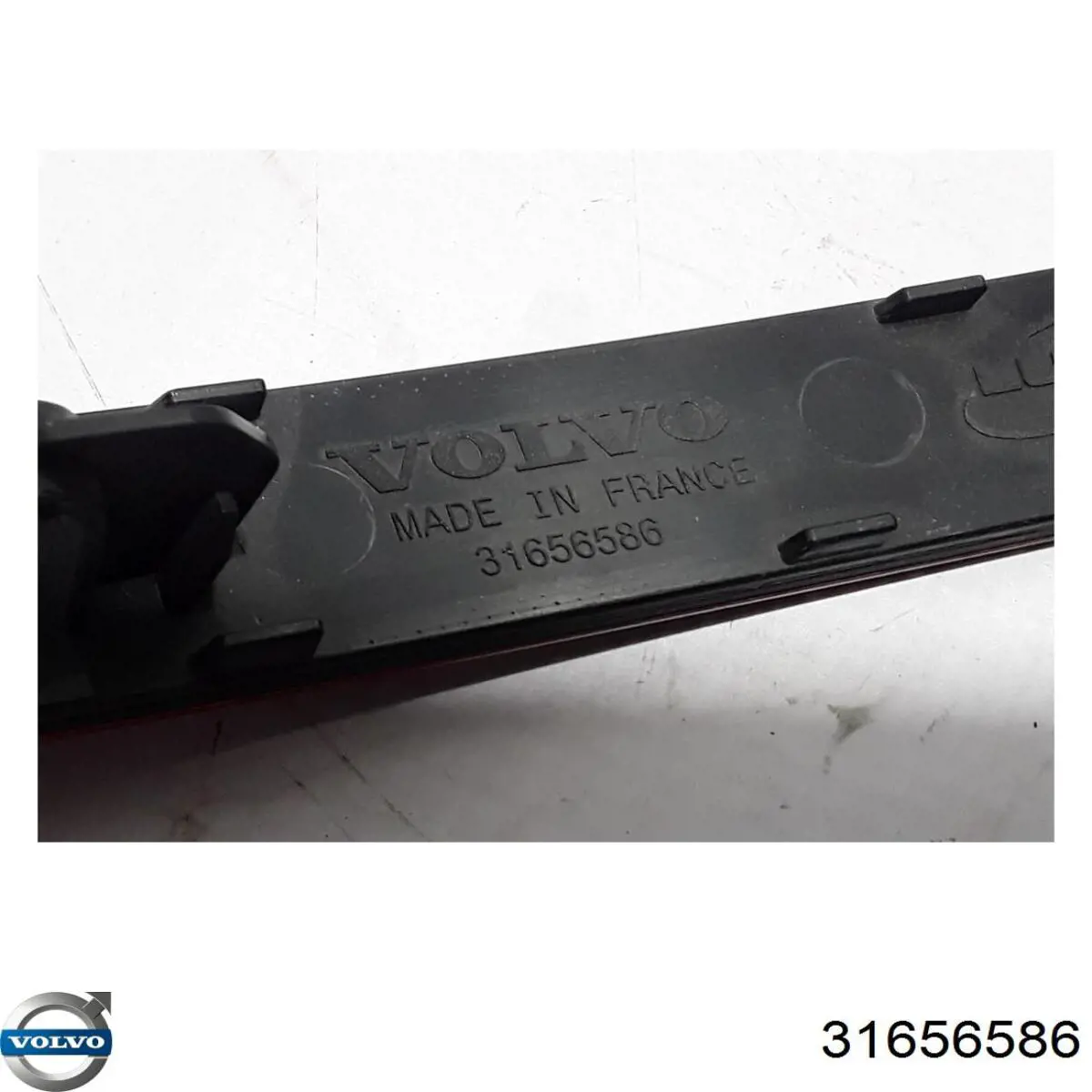 32337874 Volvo Левый катафот бампера