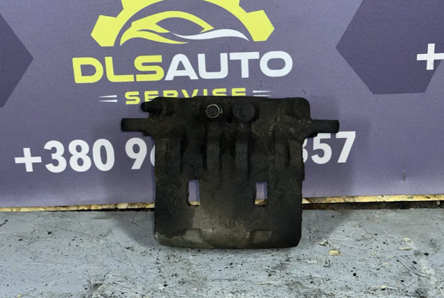 1454527 FORD Суппорт тормозной передний левый купить в Ровно