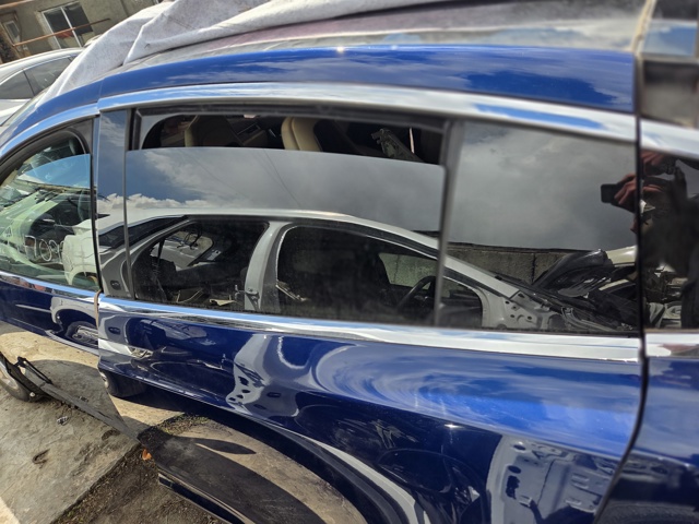 Дверь пассажирская задняя левая 1069537E0A TESLA