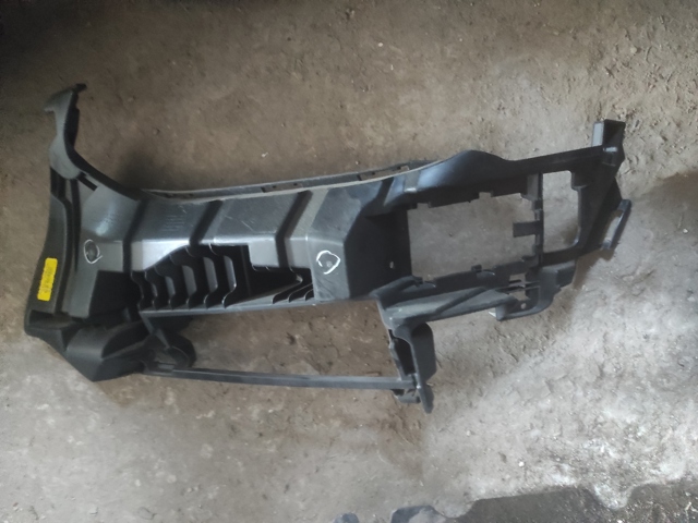 Кронштейн крепления противотуманной фары, левой 51117399977 BMW