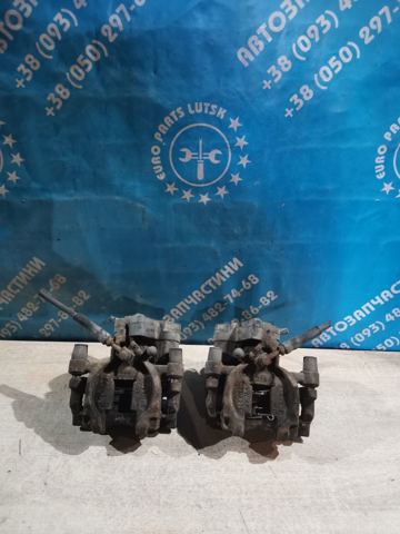 Суппорт тормозной левый задний 8V0615423D VAG