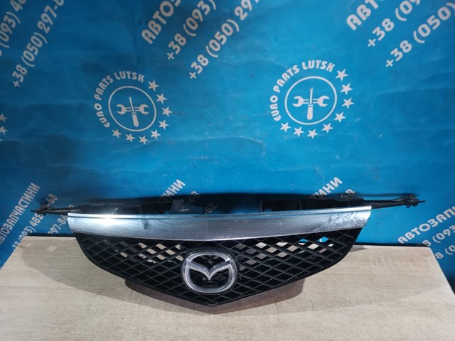 Облицовка радиатора C14550710 MAZDA