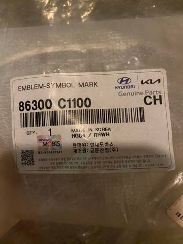 Фирменный значек решетки радиатора 86300C1100 HYUNDAI