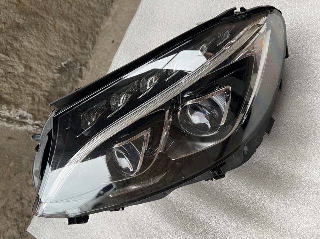 Вставка фары левой A2059067902 MERCEDES