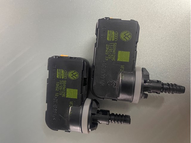 Регулятор высоты фары 5G0941295 VAG