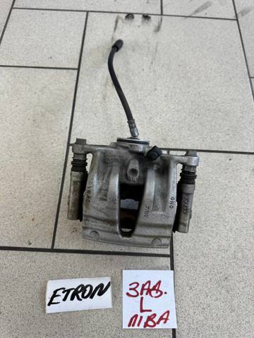 Суппорт тормозной левый задний 4M0615403F VAG