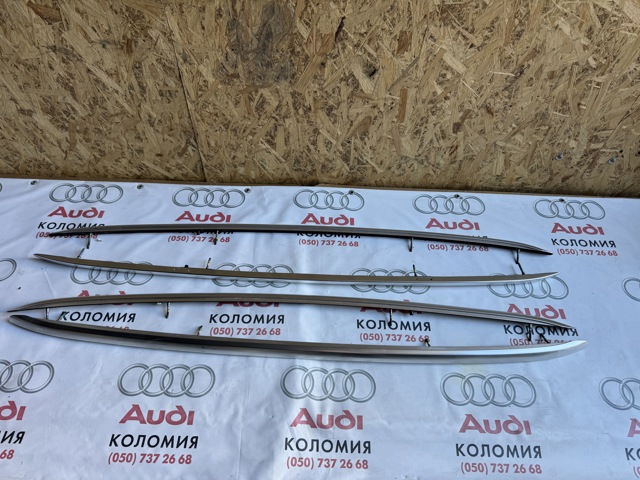 Рейлинг крыши левый 80A860021M VAG