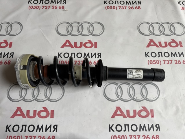 Стойка передняя левая 8W0031AA VAG