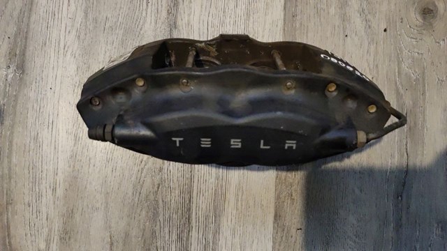 102764300A TESLA Суппорт задний левый купить в Харьков