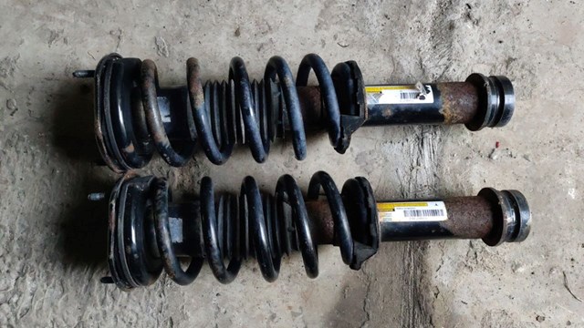 Стойка амортизатора передняя 103060700C TESLA