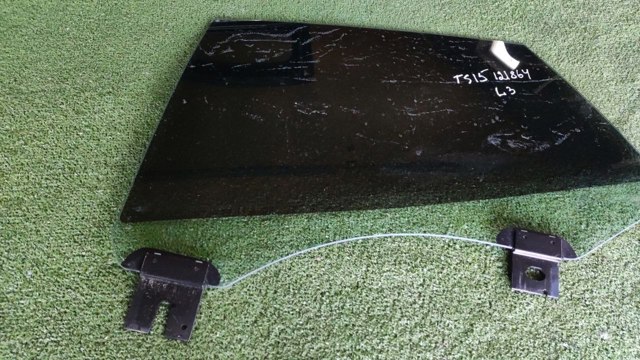 TESLA 600633500D Стекло двери задней левой в наличии Чернигов
