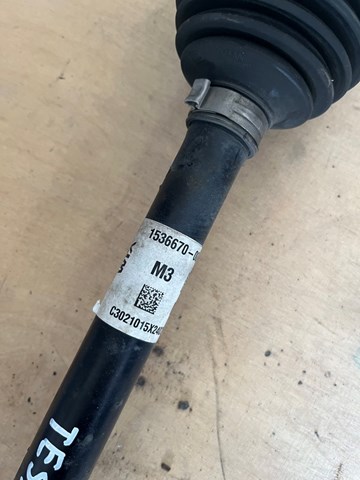 TESLA 153667000B Полуось (привод) передняя левая в наличии Кривой Рог