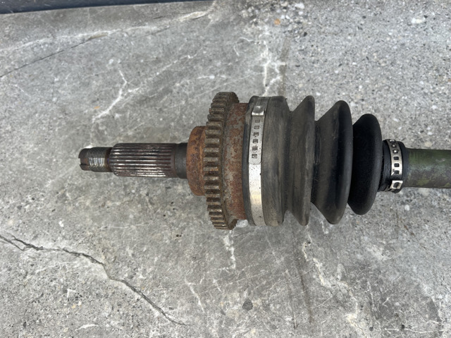 Полуось передняя левая 0K5542560XA HYUNDAI