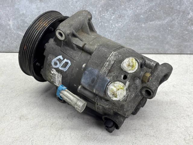 Компрессор климатической установки 13250609 OPEL