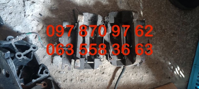 7701049091 Суппорт тормозной передний левый купить Ужгород