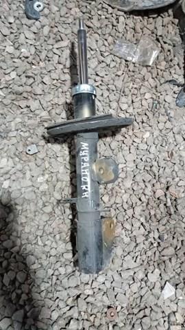 Амортизаторная стойка передняя правая E43025AA0D NISSAN