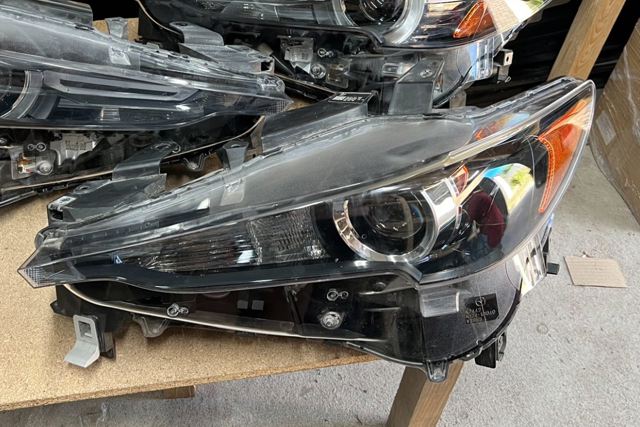 Фара основная левая KL2J51041A MAZDA