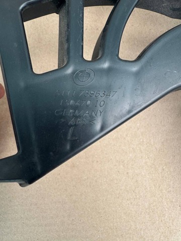 Левый кронштейн переднего бампера 51117385347 BMW