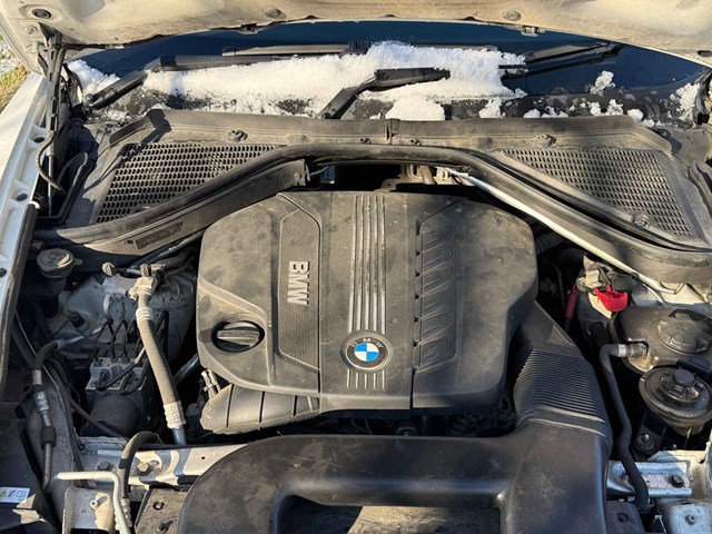 Двигатель голый 11002180690 BMW