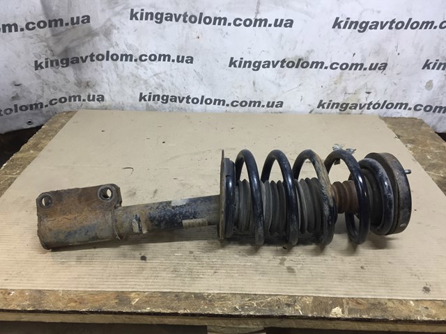 Амортизатор передний левый 31316764601 BMW