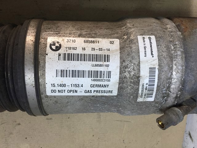 Амортизатор задней подвески, левый 37106858811 BMW