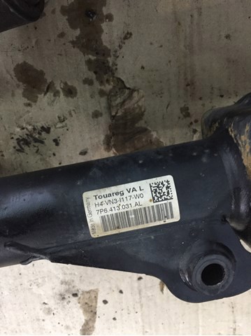 Амортизатор передней подвески левой 7P6413031AL VAG