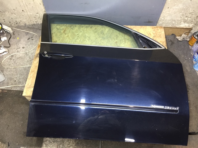 Пассажирская передняя дверь 41517211424 BMW