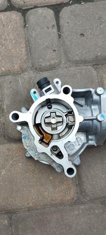 Насос вакуумный 06K145100BB VAG