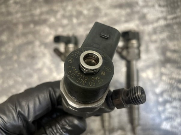 Форсунка дизельная в сборе 0445110096 TDM