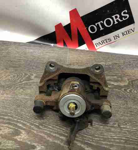 Суппорт тормозной левый задний LR061381 LAND ROVER
