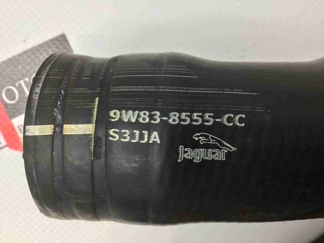9W838555CC Шланг (патрубок) термостата купить Ирпень