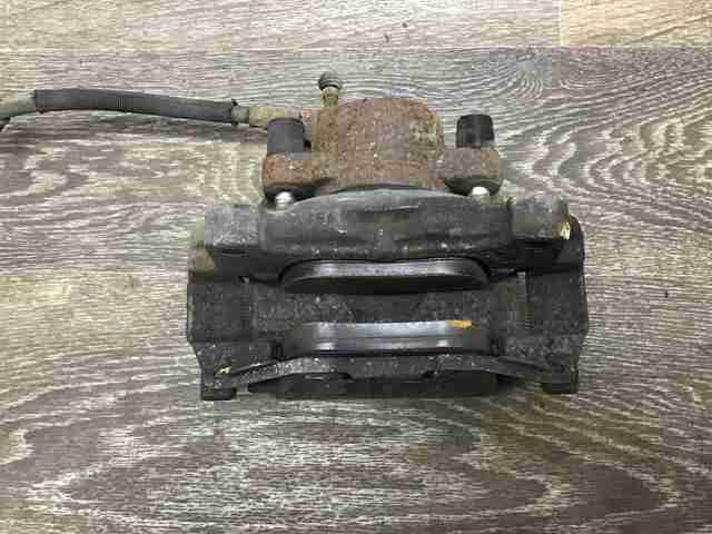 Суппорт тормозной, передний, левый LR015387 LAND ROVER