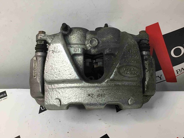 LR091302 LAND ROVER Суппорт тормозной передний правый купить в Запорожье