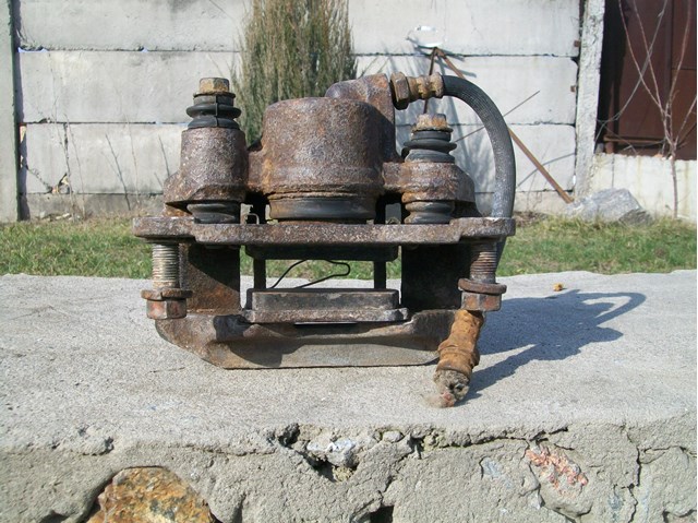 Суппорт тормозной левый задний MR510541 MITSUBISHI
