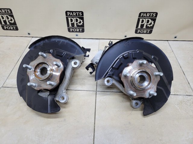 Цапфа поворотного кулака 400156RA0A NISSAN