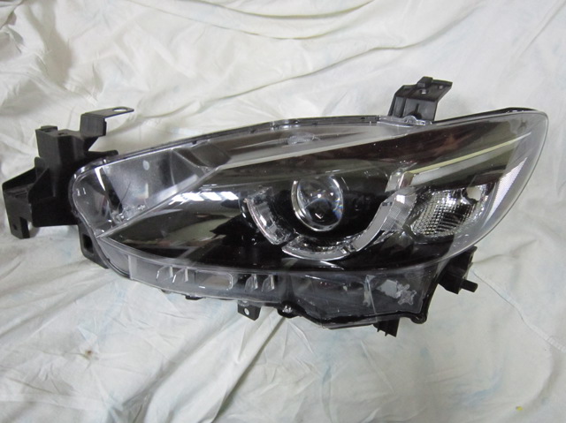 Фара левая передняя GMH351041F MAZDA