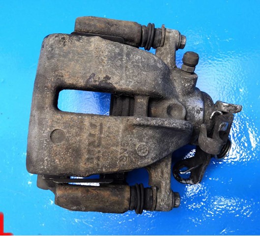 Суппорт тормозной левый задний 7H0615423A VAG