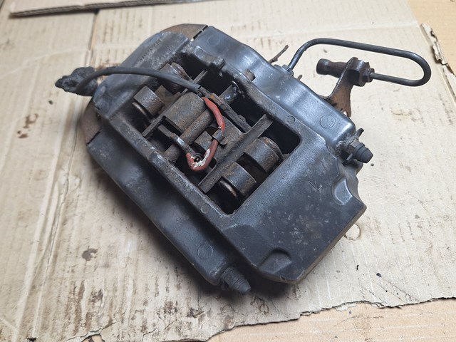 Задний левый суппорт 7L6615423L VAG