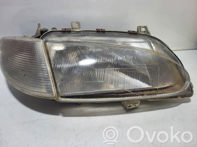 Фара основная левая 0301048311 FORD