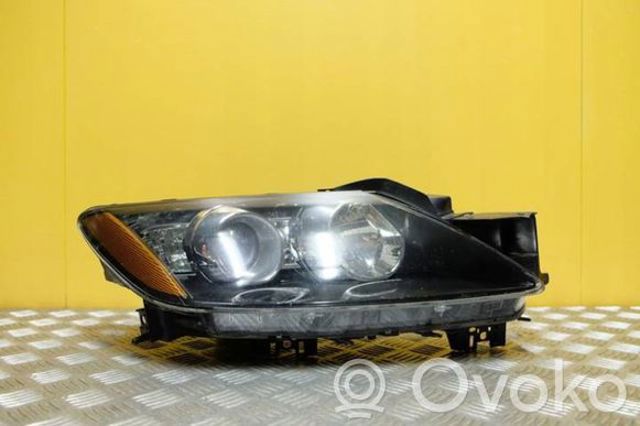 Основная фара - вставка EH1051030 MAZDA