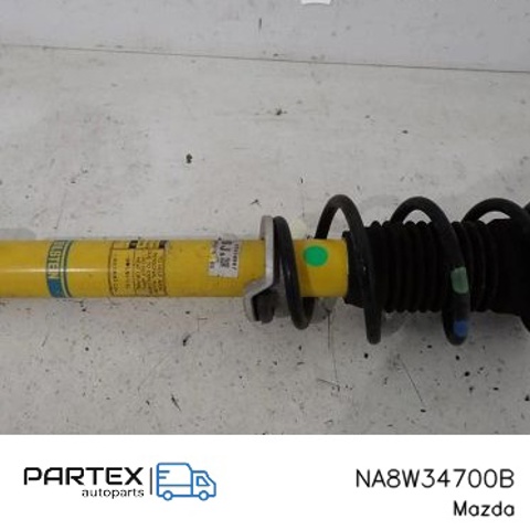 NA8W34700B Амортизатор передний купить Хмельницкий